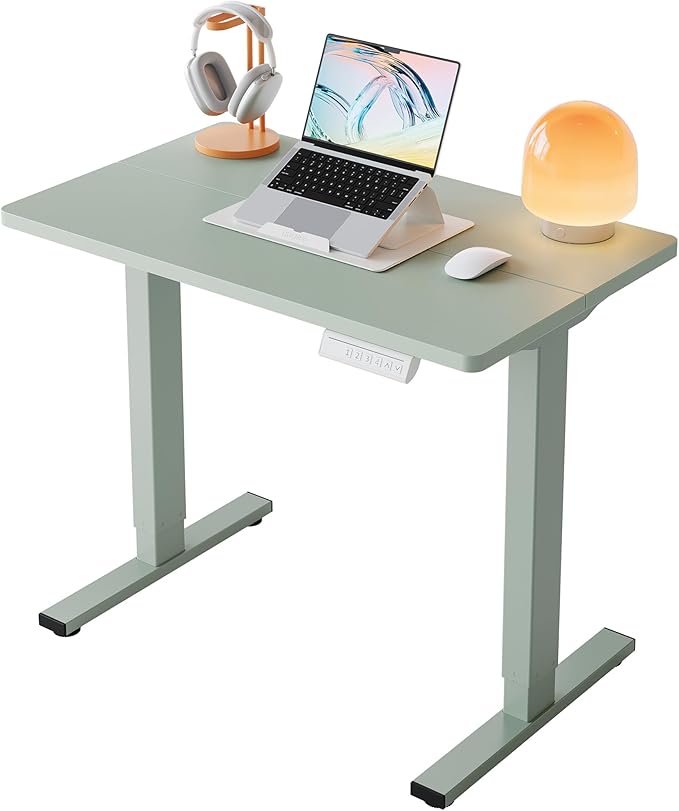 HUANUO 32x19 Inch Small Electric Standing Desk, Adjustable, Sage Green | Compact Home Office Desk, 176lbs heavy duty lifting with 4 height presets. M8 screw holes ready for DIY mobile wheels by HUANUO