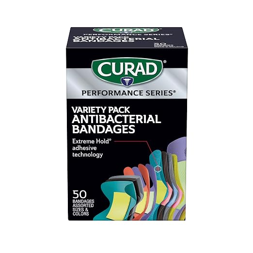 CURAD Performance Series Antibacterial Bandages, Extreme Hold Adhesive Technology, Finger & Knuckle Bandages, Flexible Fabric, Variety Pack with Assorted Sizes & Colors, 50 Count by Curad