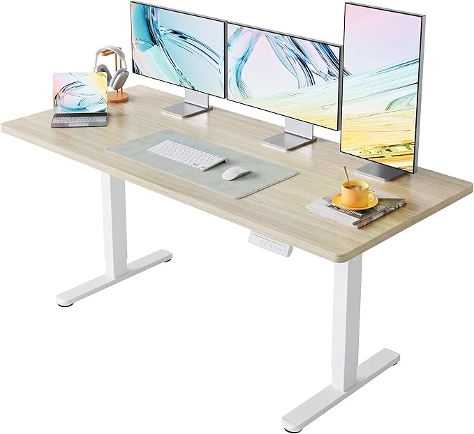 HUANUO 63 x 28 inch Electric Standing Desk Adjustable Height, 4 Memory Height Settings, Sit Stand Up Desk for Home Office & Computer Workstation, Light Walnut by HUANUO